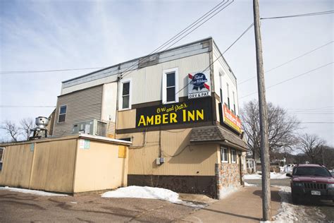 Amber inn - The Amber Inn was established in the height of the lumbering era by Eau Claire’s own Walter Brewing Co. as a way of selling the firm’s fermented beverages directly to the city’s booming populace. Such brewery-owned bars were common back then, and they mainly catered to working-class folks. After the lumber era faded and Eau Claire became ...